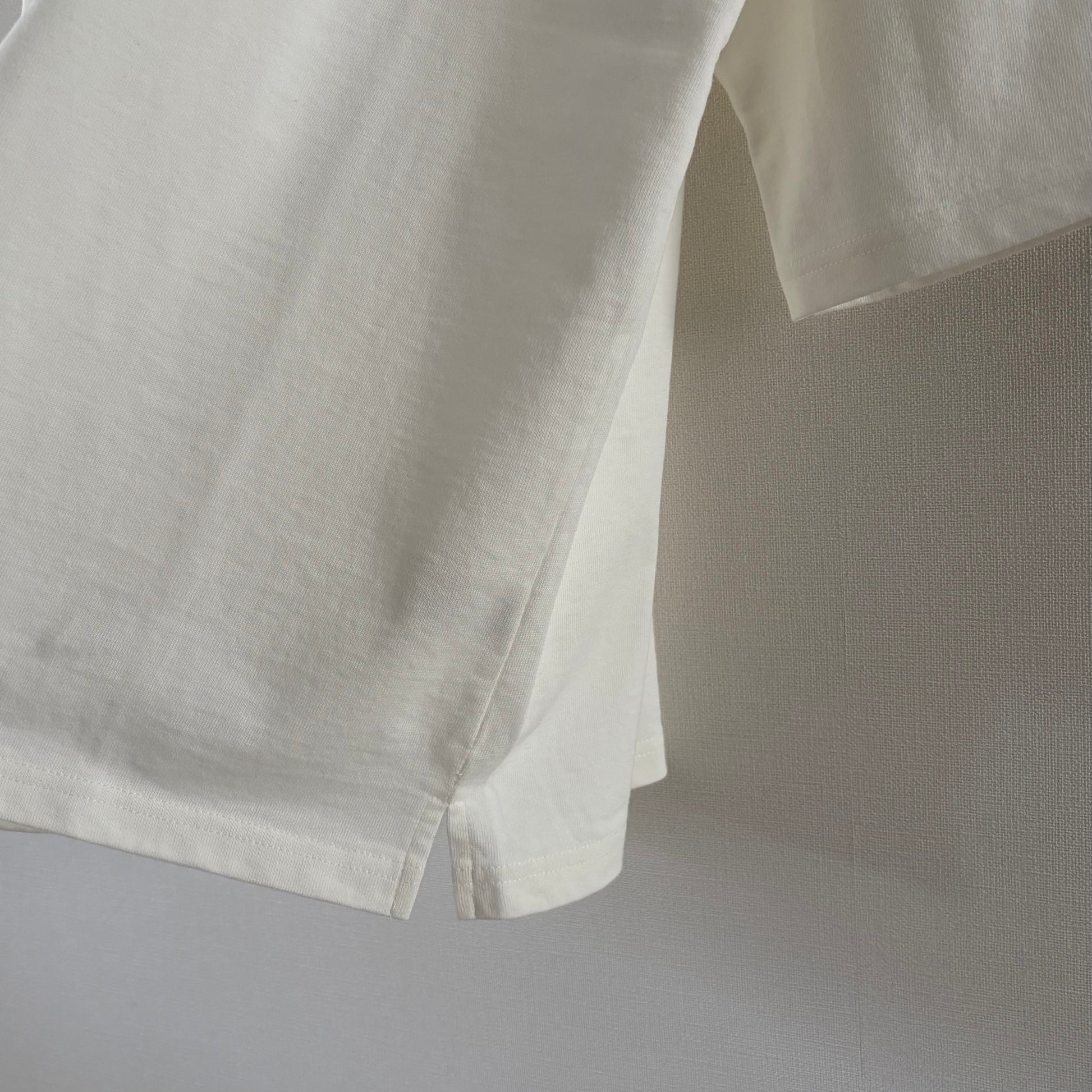 Cleaveland<br> "De partout"<br> Pull à manches courtes blanc cassé