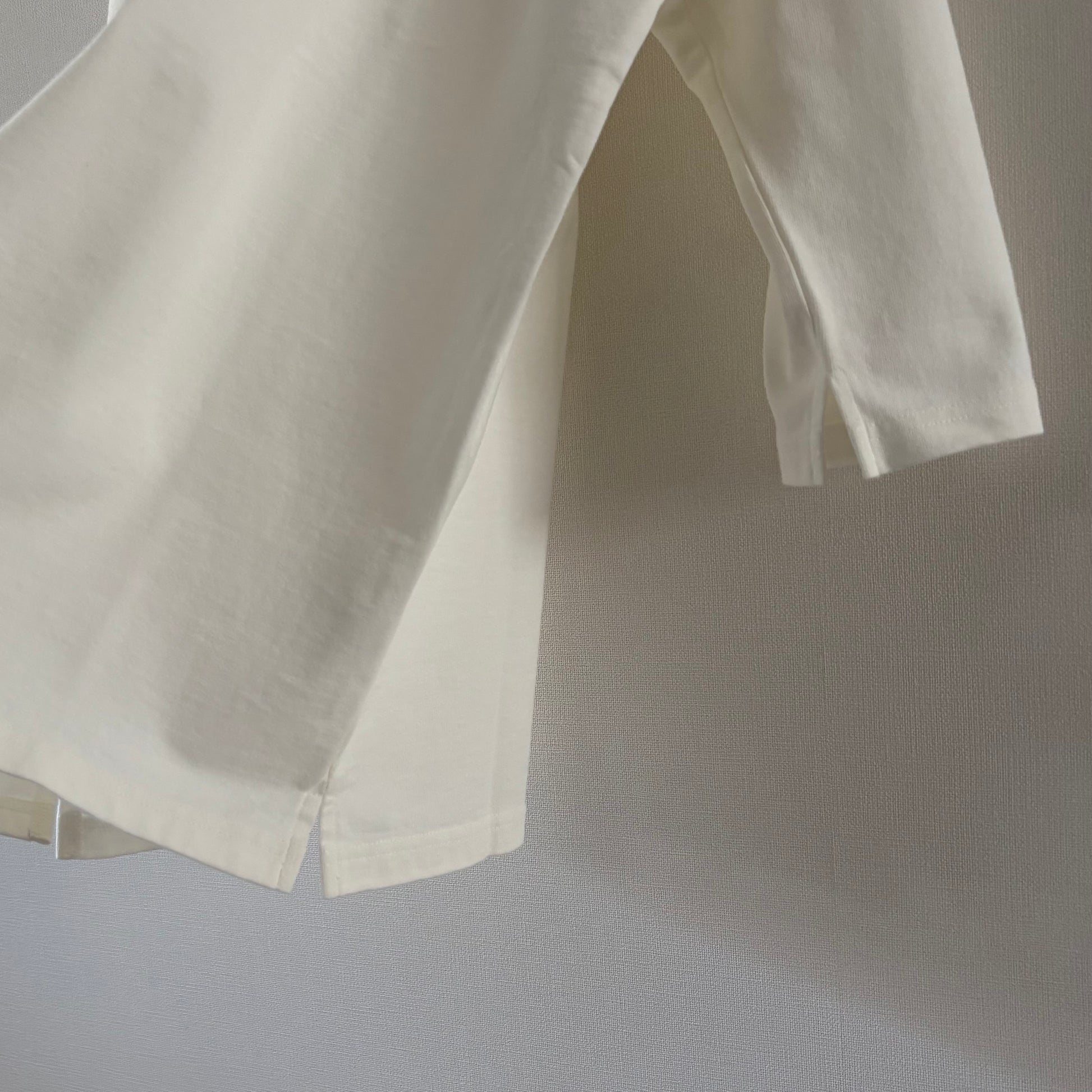 Cleaveland<br> "De partout"<br> Pull en V à manches 3/4, blanc cassé