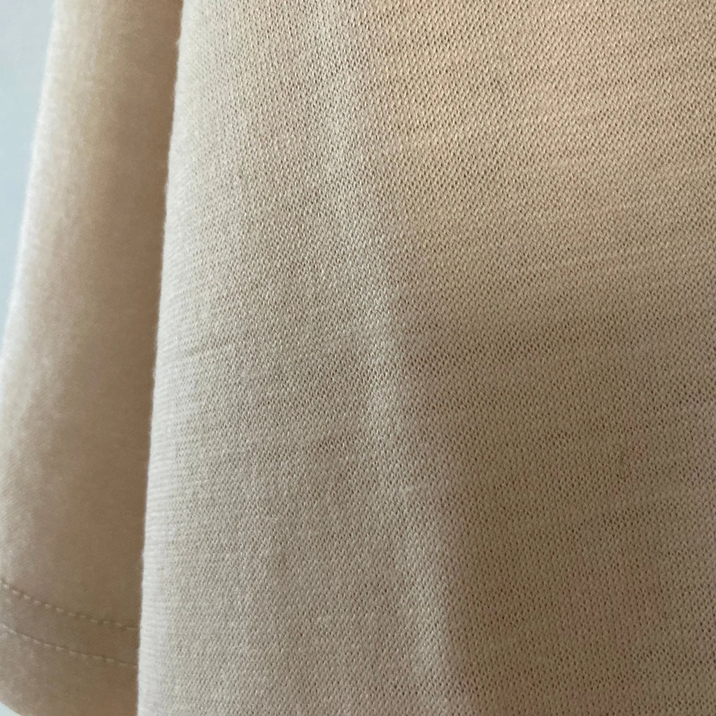 Cleaveland<br> "De partout"<br> Pull en V à manches courtes en jersey de laine beige moka