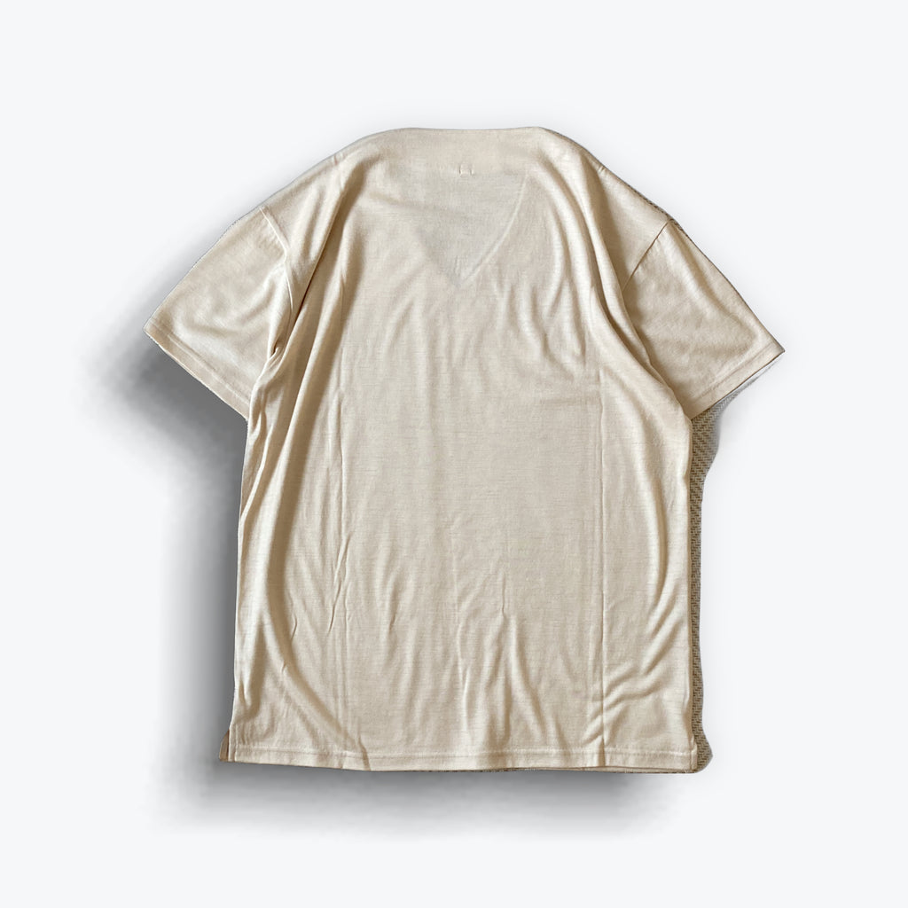 Cleaveland<br> "De partout"<br> Pull en V à manches courtes en jersey de laine beige moka