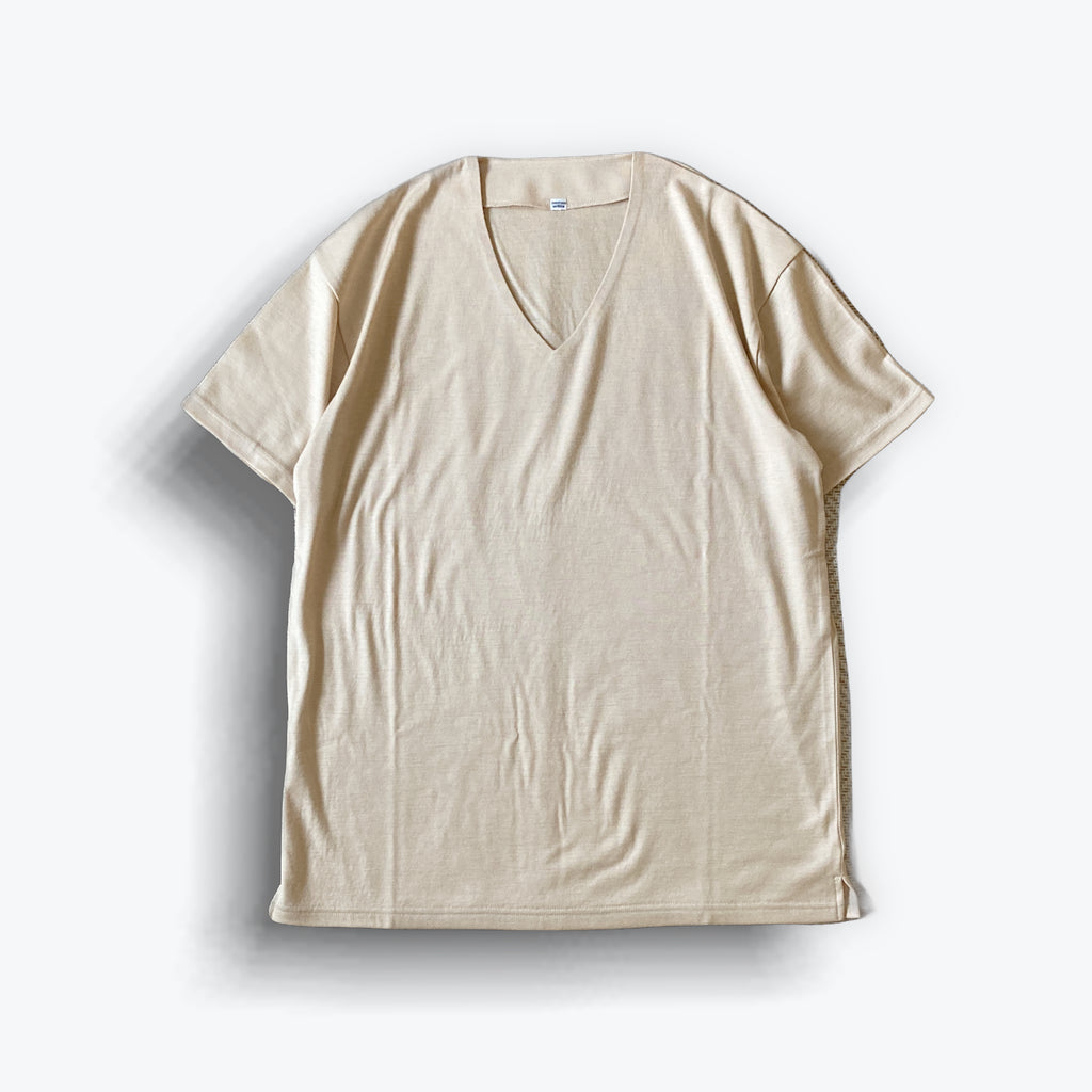 Cleaveland<br> "De partout"<br> Pull en V à manches courtes en jersey de laine beige moka